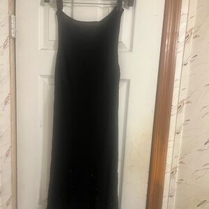 Women’s size 4 100% silk black dress with beaded accent by Jones New York dress